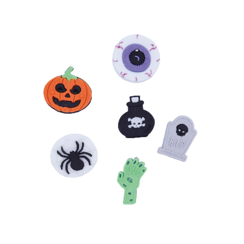 Edible Halloween cupcake toppers pack of 6 gumpaste icing decorations.  Includes 1 each of a pumpkin, eyeball, potion, tombstone, spider, and a zombie hand.