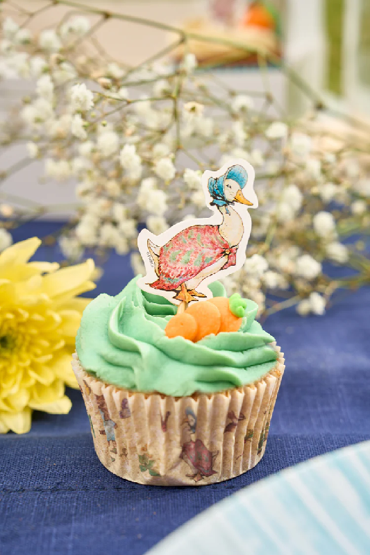 Example of Use - Jemima Puddle Duck Cupcake pick atop a piped green buttercream swirl cupcake, decorated with a handmade fondant carrot