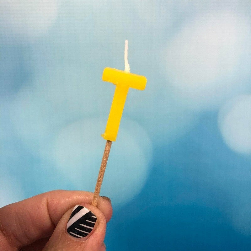 Alphabet or numeral candle on wooden pick Letter T Yellow